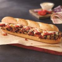 Chicken Club Sub · Chicken breast strips, bacon, tomatoes, mayo and 3 cheese blend.