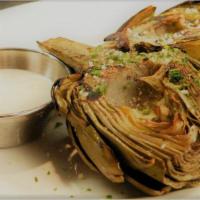 Grilled Artichokes  · Fresh from CA. Parmesan dusted and served with aioli sauce.