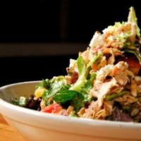 Famous Chicken Salad · Field greens tossed with fresh, all-natural, grilled chicken breast, goat cheese, toasted al...