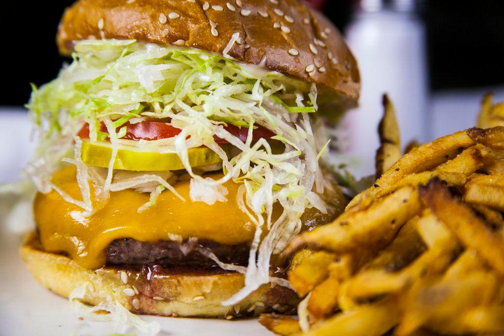WCG Cheeseburger · Sharp cheddar cheese, lettuce, tomato, diced onion, pickles and mayonnaise.