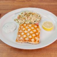 Perfectly Grilled Atlantic Salmon · Responsibly sourced, filleted in house, seasoned and grilled.