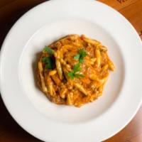 Pici alla Toscana · Twisted pasta strands, tuscan beef and pork ragu.