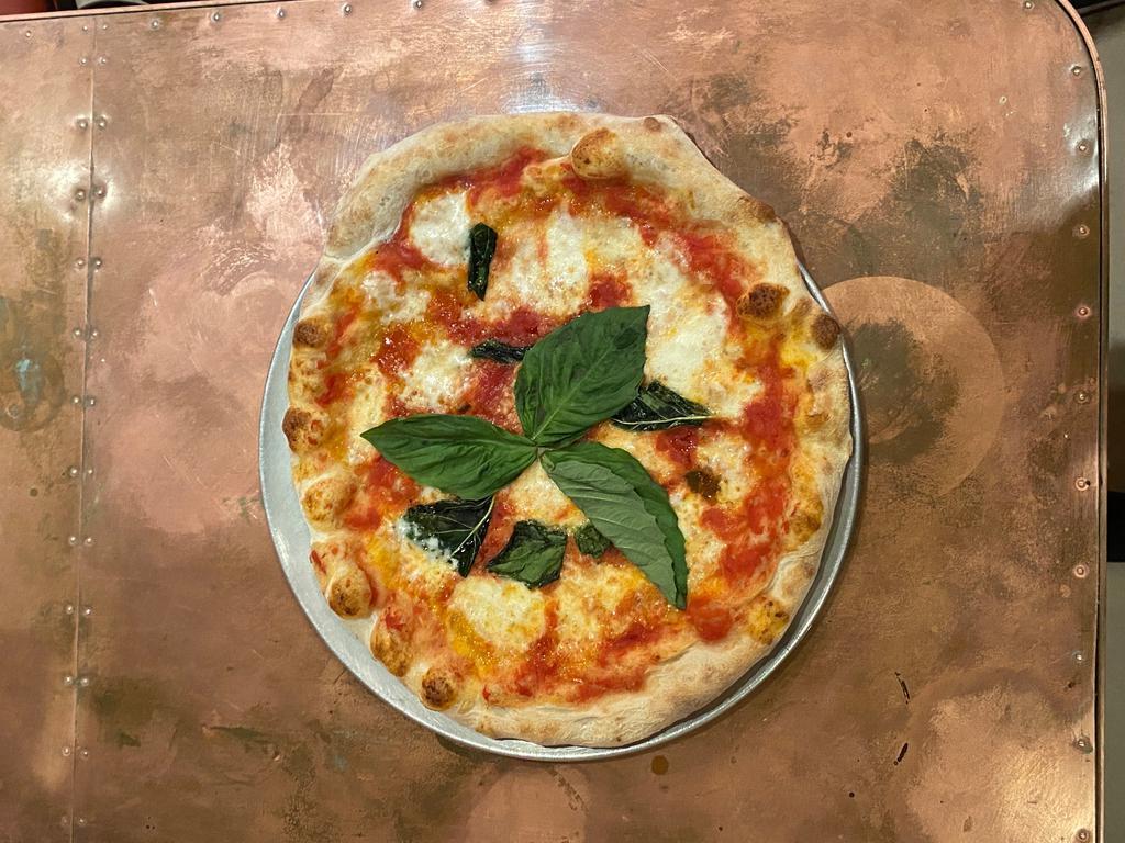 Pizza Margherita · And The undisputed classic with a delicious Fior di Latte mozzarella coming straight from Italy, tomato sauce, topped with fresh basil