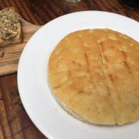 Chisolino Robiola Cheese and Black Truffles · Emilian style focaccia with robiola cheese and black truffles 