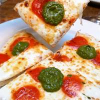 Pizza-Style Focaccia · Emilian style focaccia pizza-STYLE with tomato mozzarella and pesto 