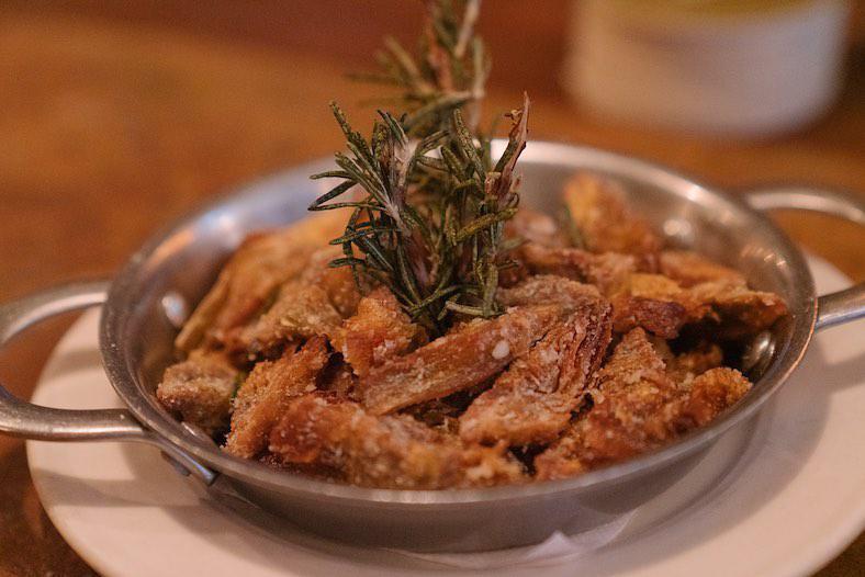 Carciofi Fritti · Pan-fried baby artichokes tossed with rosemary and Parmigiano cheese.
