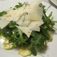 Insalata Di Carciofi · Baby artichoke salad, arugula, shaved parmigiano cheese ad lemon dressing.