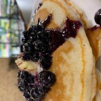 Blueberry Pancakes · 3 short of stack pancake, top with melt blueberries.
