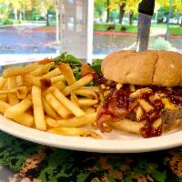 BBQ Burger · Served with bacon, cheddar cheese, onion strings and BBQ sauce. 