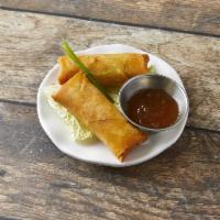 Thai Egg Rolls · Deep-fried egg roll filled with ground chicken and mixed with
vegetables served with sweet a...