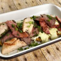 The Wholyyyy Tostones · Picanha, chicken, and sausage with shredded white cheese and homemade green sauce.