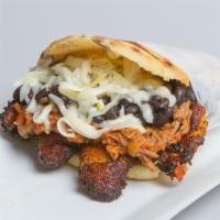 Pabellon Criollo Arepa · Shredded beef, sweet plantain, black beans and shredded white cheese.