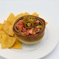 Black Bean Chili · Our homemade vegetarian chili with black beans, corn, onion and garlic in a spicy southweste...