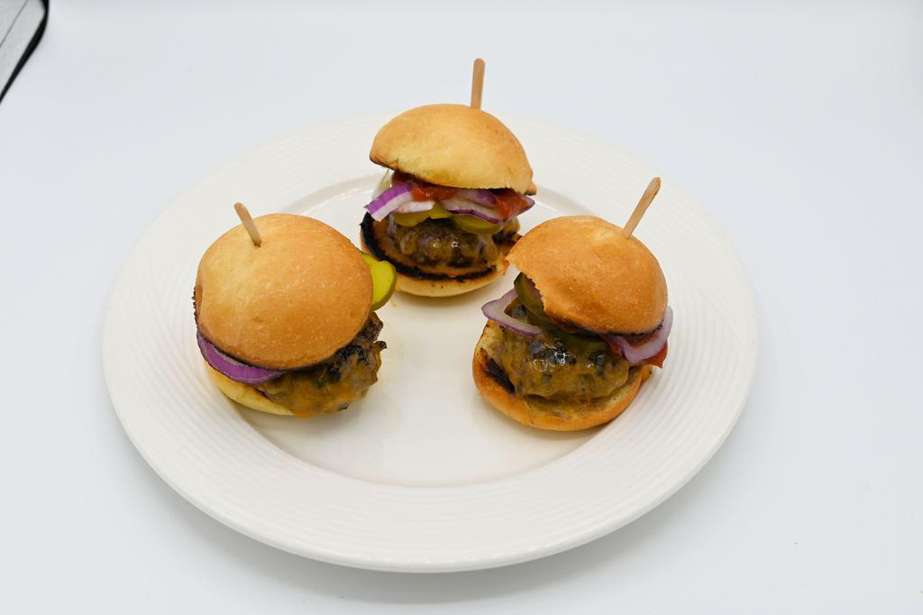Beef Sliders · 3 fresh natural angus chuck sliders on brioche buns with cheddar cheese, mayo, ketchup, red onion, and pickle.