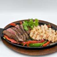 Fajitas · Our classic fajitas served on a sizzling hot skillet with grilled onions and peppers, salsa,...
