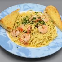 Shrimp Scampi · Extra large shrimp sautéed with fresh garlic and white wine over linguini.