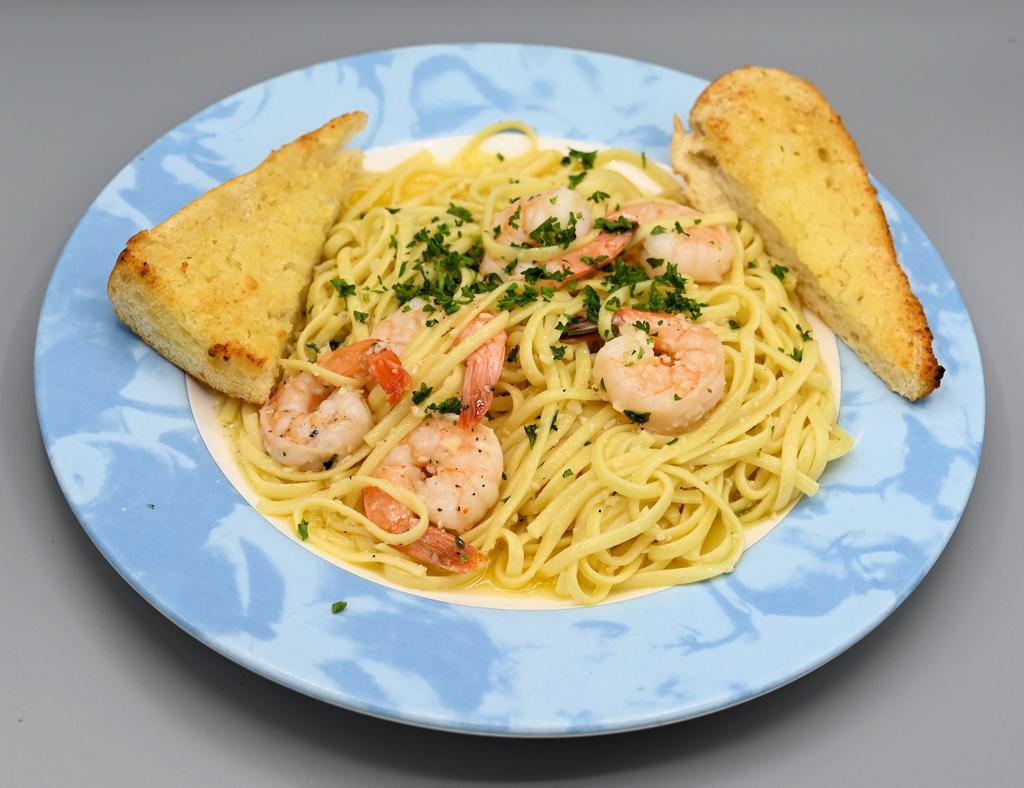 Shrimp Scampi · Extra large shrimp sautéed with fresh garlic and white wine over linguini.