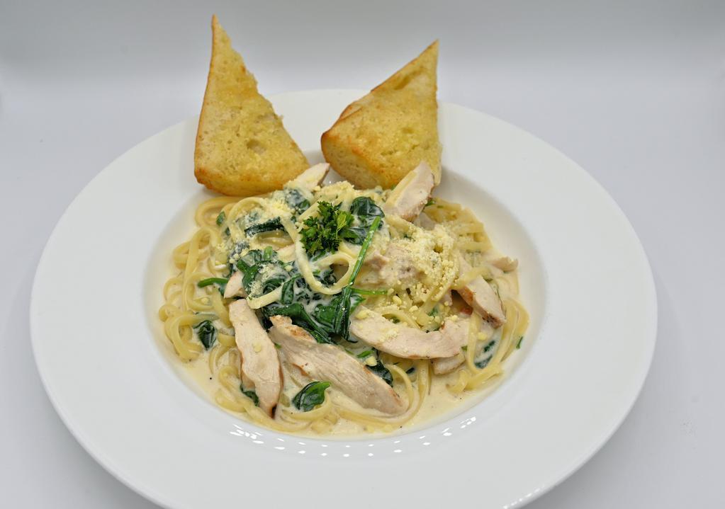 Chicken with Garlic Alfredo · Linguini with our creamy garlic alfredo sauce, all natural chicken breast, and fresh spinach.
