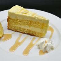 Limoncello Cake · Limoncello-mascarpone cake with lemon glaze and homemade whipped cream.