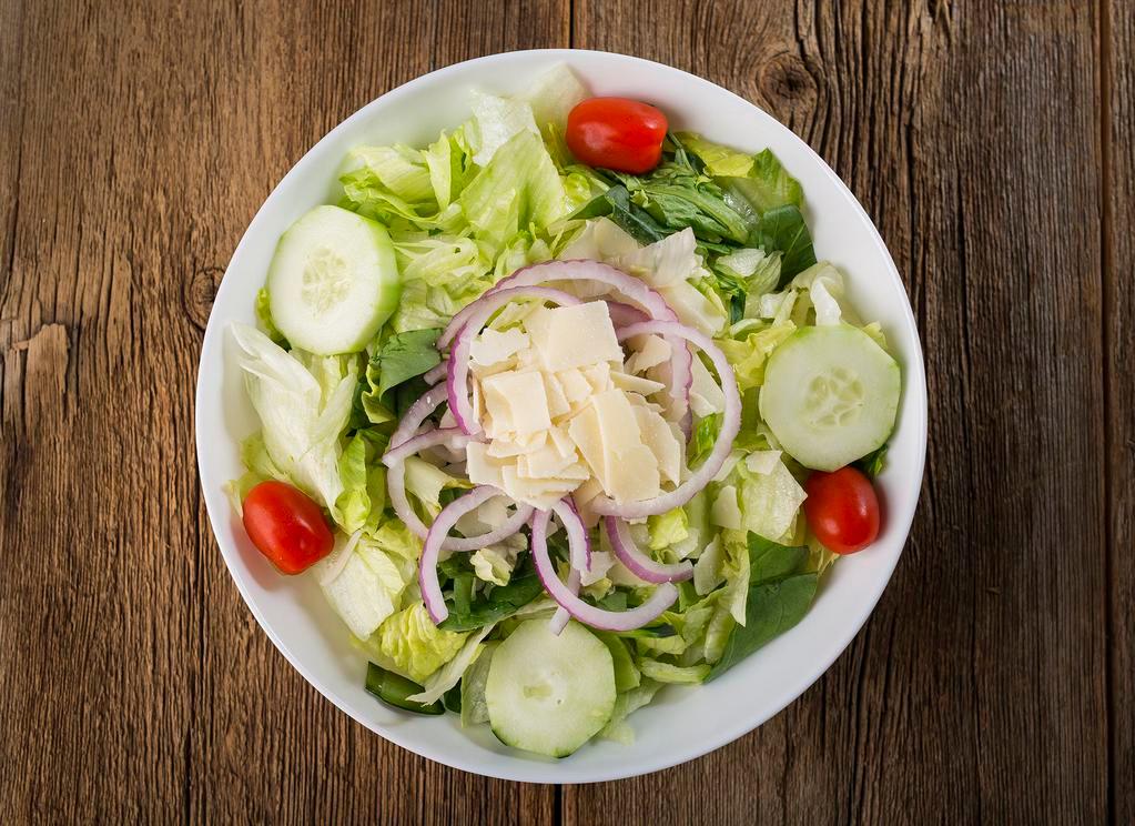 Side Salad · Romaine and Iceberg lettuce, spinach leaves, cucumbers, grape tomatoes, red onion, and shaved Asiago cheese.