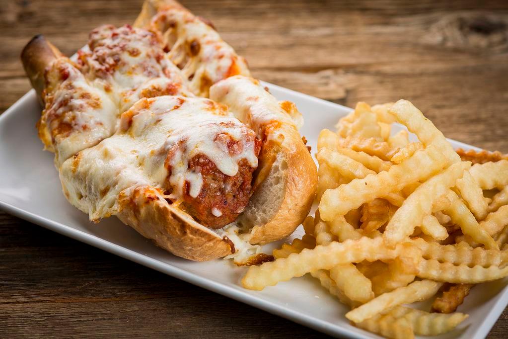 Meatball Parmigiana Sandwich · Meatballs baked with marinara sauce and mozzarella cheese on top. Prepared fresh and served with a side salad or french fries.