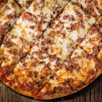 Meat Mania Pizza · Gourmet Italian sausage, meatballs, pepperoni, and bacon.