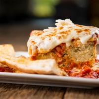 Lasagna · Serves 1-2. Layers of ribbon noodles and three cheeses, marinara sauce,  baked mozzarella ch...