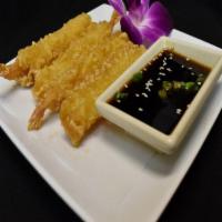 Shrimp Tempura · Battered shrimp deep fried and served with a sweet sauce