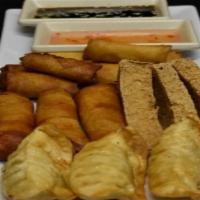 Royal Combination · Cheese rolls (4) Spring rolls (4) Shrimp in a blanket (3),Triangle bean curds (3) and Pot st...