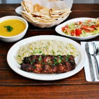 Kefta Kabob · Grilled ground beef with onions and parsley.