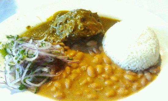 Seco Norteno · Beef stewed in cilantro and Peruvian spices sauce served with peruvian beans and steam rice.