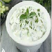 AZ5.Yogurt & Cucumber Dip (Must-o- Khiar) · Creamy yogurt infused with chopped cucumbers, onions and mint; served with bread. Gluten fre...