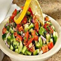 S2. Persian Salad (Salad Shirazi) · Chopped tomatoes, red onions, cucumbers, mixed with mint, olive oil, lemon juice and balsami...