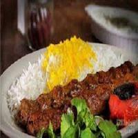 K2. Kabob Koobideh and Rice · 2 skewers of juicy ground beef kabobs served over fluffy saffron rice, with sides of onions ...