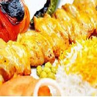 K8. Chicken Fillet · 1 skewer of charbroiled marinated chicken tenderloin served over fluffy saffron rice, sides of onions and grilled tomatoes. Gluten Free.