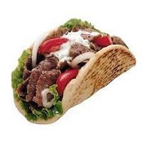 M2. Gyro Wrap · Lettuce, onions, tomatoes, cucumbers, tzatziki and feta cheese, wrapped with pita bread.
