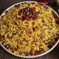 Adas Polo · Lentil rice. A mixture of sauteed onions, golden raisins, lentils, dash of cinnamon and Pers...