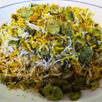 Baghali Polo · Dilled rice. A mixture of sauteed onions, lima beans, dills and Persian seasoning mixed with...