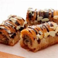 Baklava Nut Roll · A Sweet crunchy, one baklava roll with walnut ,almond and chocolate.