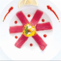 Carpaccio · Comes with your choice of albacore, tuna, or salmon with sliced onion, smelt egg, and carpac...