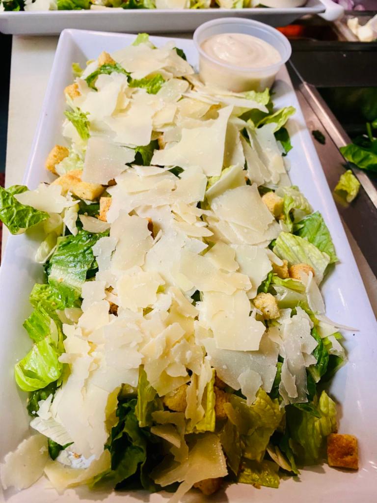 Caesar Salad · Romaine lettuce with croutons and Caesar dressing.