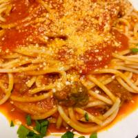Meat Sauce · Homemade meat sauce. Served over pasta with a small salad.