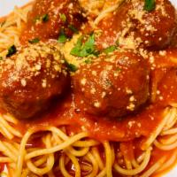 Meatballs and Pasta · Served over pasta with a small salad. 