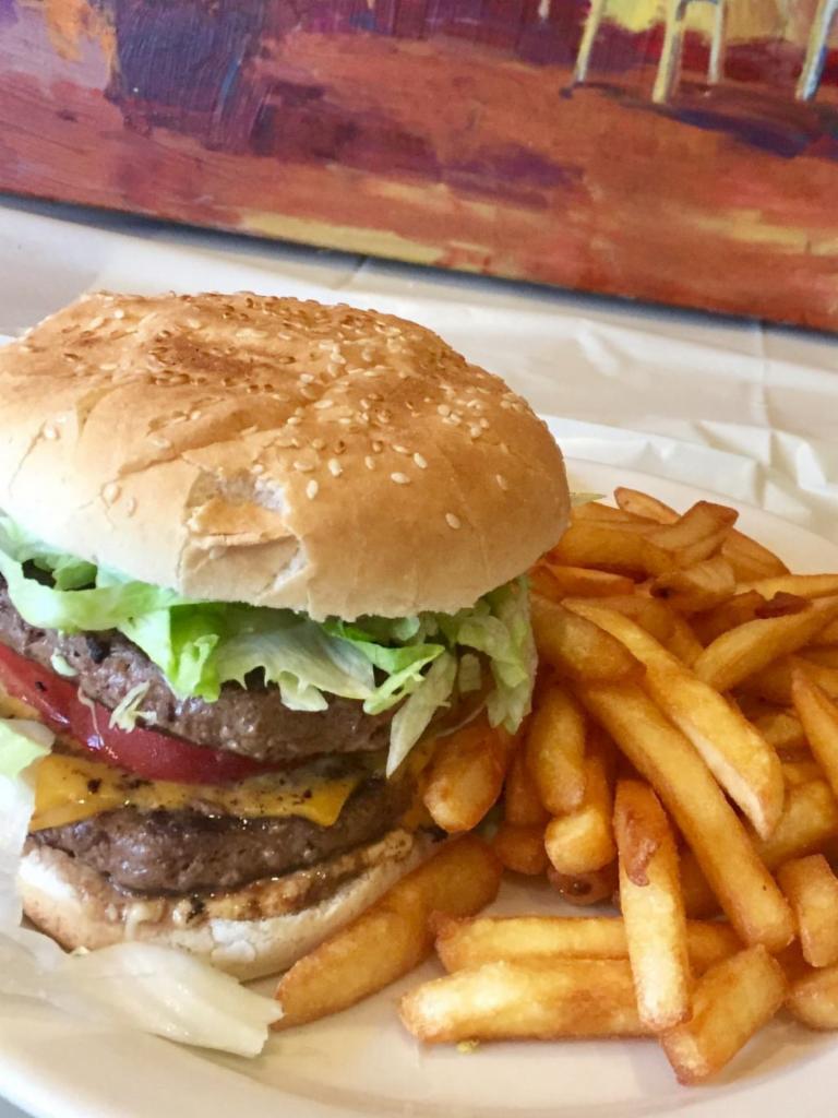 California Cheeseburger · Served with lettuce, tomato, mayonnaise. Served with french fries.