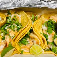 Camaron Tacos (3) · Grilled shrimp. Soft corn tortillas served with cilantro, onions and salsa.