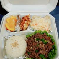 Beef Bulgogi Bento Box · Comes with Beef bulgogi, cabbage salad with special sauce, 2 fried dumplings, rice, orange, ...