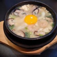 Clear Tofu Soup with Seafood & Mushroom · Regular or spicy.
Spicy tofu soup is clear - made with grinded serrano pepper to make it spicy