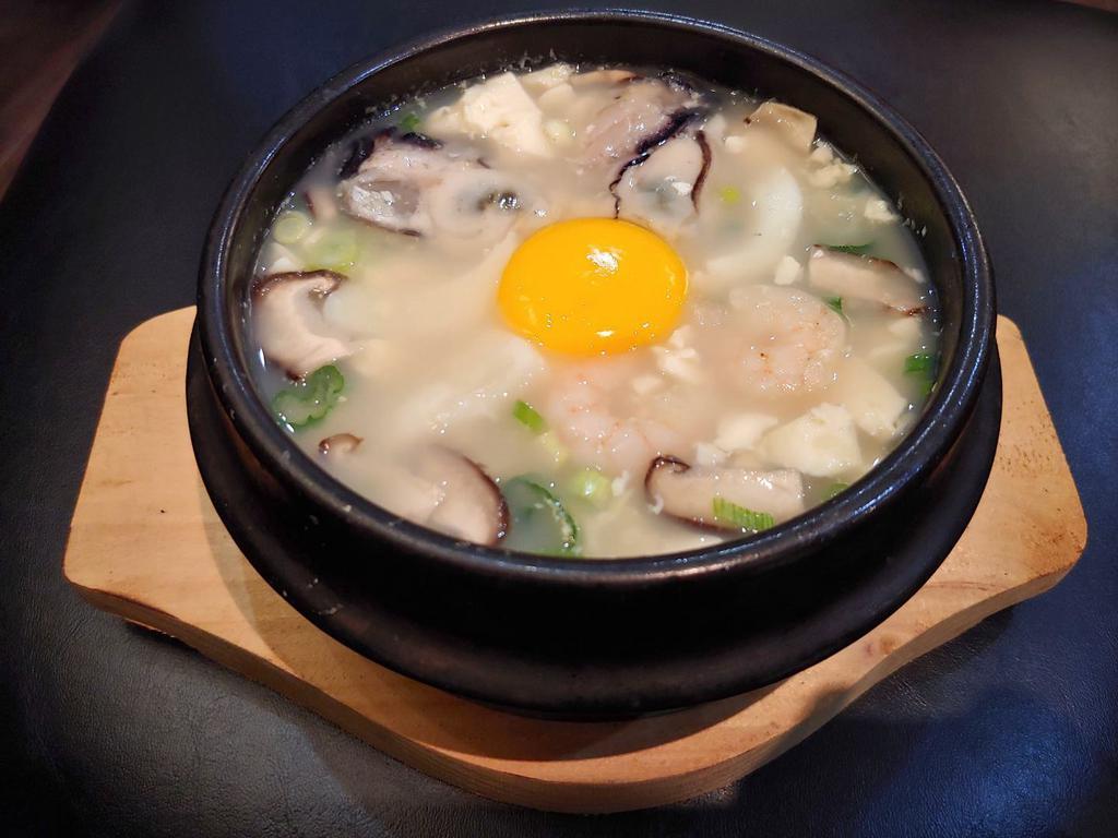 Clear Tofu Soup with Seafood & Mushroom · Regular or spicy.
Spicy tofu soup is clear - made with grinded serrano pepper to make it spicy