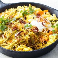 Vegetable Dum Biryani · Mixed Vegetables marinated in Hyderabadi style with Biryani spices, fried onions and yogurt ...
