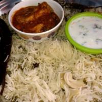 Goat Curry 8 Oz  and 15 Oz Bagaara Rice Mini (Pulao)  Combo · A great combination of awesome Hyderabadi Goat Curry (8 Oz) served with 1 Roti and 15 Oz Ric...